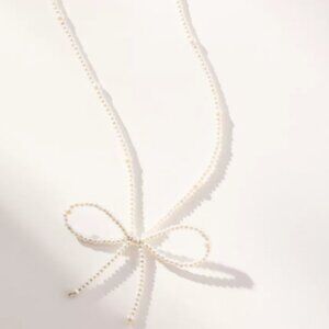 Jewelry Archives - Anthropologie bow necklace and ring bundle